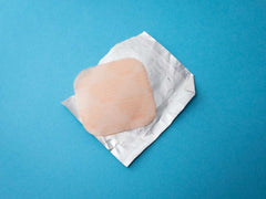 natural hormone replacement therapy patch on blue background