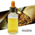 Bottle of nicotine extract next to loose tobacco leaves representing NRT Active Extraction process for quit smoking aids