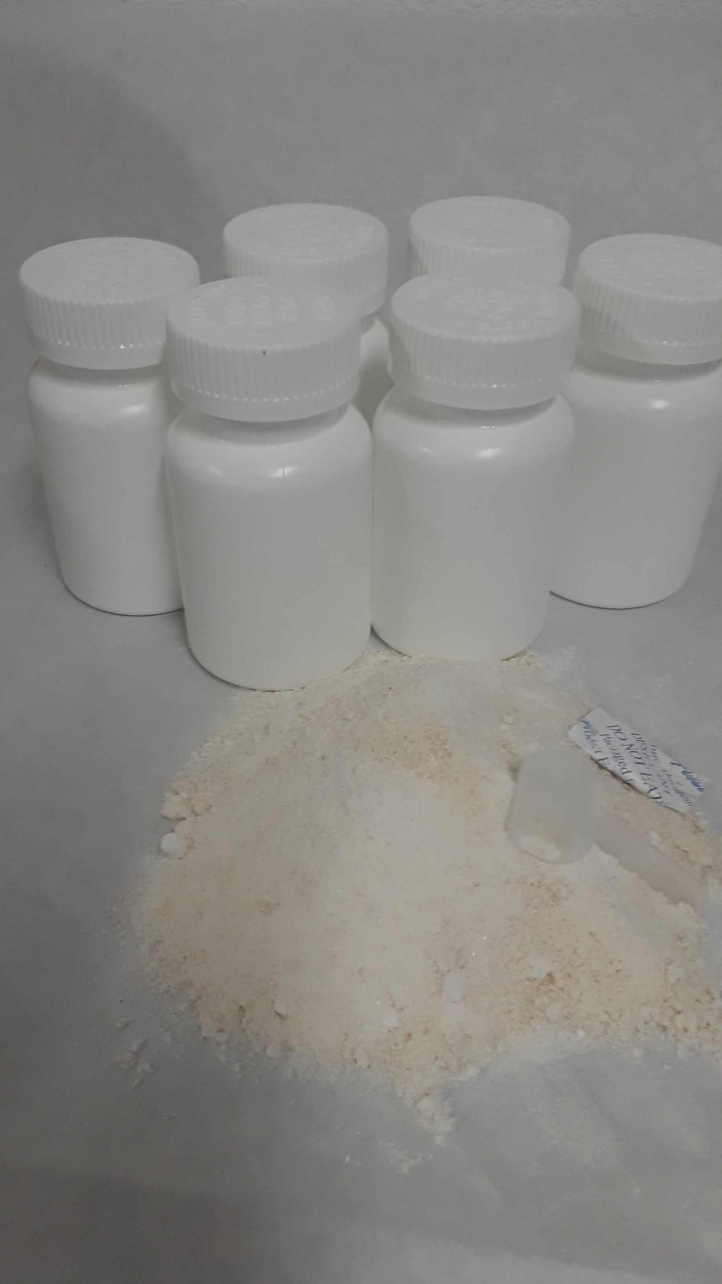 75 white bottles of Liposomal Glutathione powder for skin lightening cosmetics ingredient